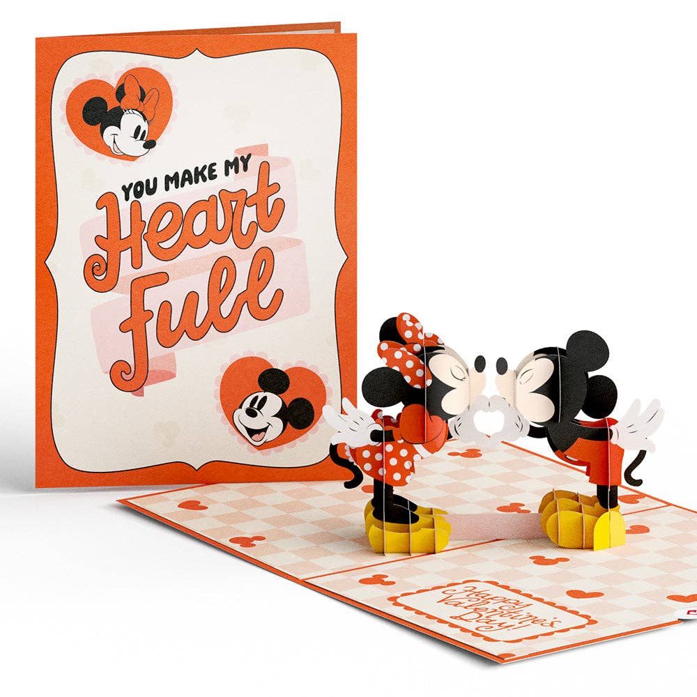 Open Mickey and Minnie card beside the heart-themed cover