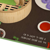 Close-up of the paper steamer and printed friendship message