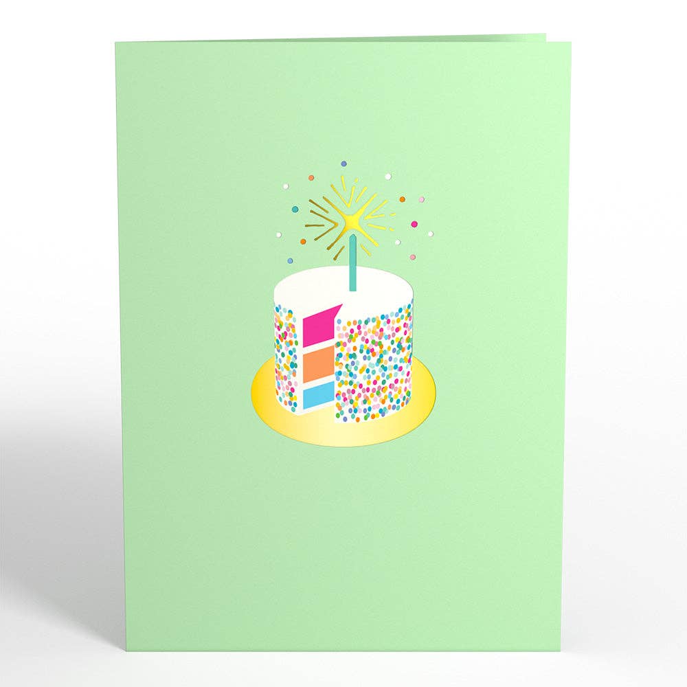 Pale green birthday card cover with a colorful cake illustration