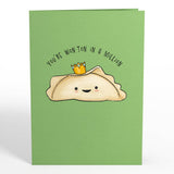 Green card cover with crowned dumpling and friendship greeting