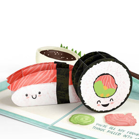 Smiling sushi pop-up scene with chopsticks and condiments